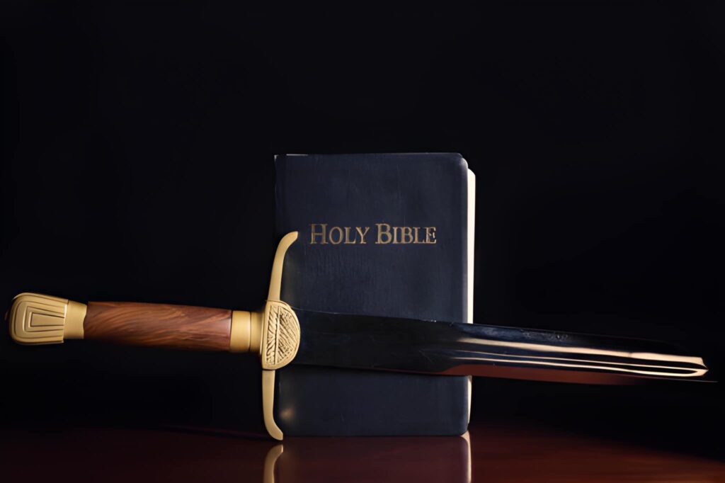 An Old long sword beside the Holy Bible